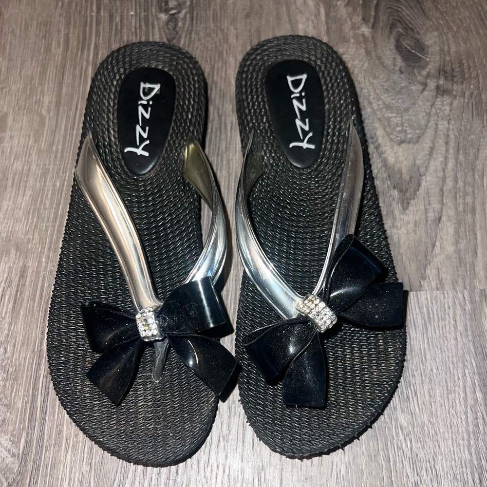 Dizzy black backless sandals with black bow and silver straps size 6